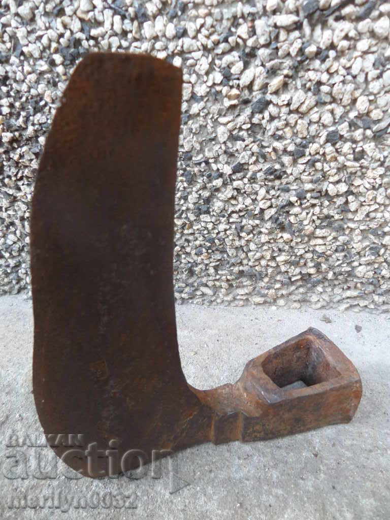 An old ax ax with a pressed toothed saber hat - 5 An old ax ax with a pressed toothed saber hat - 5