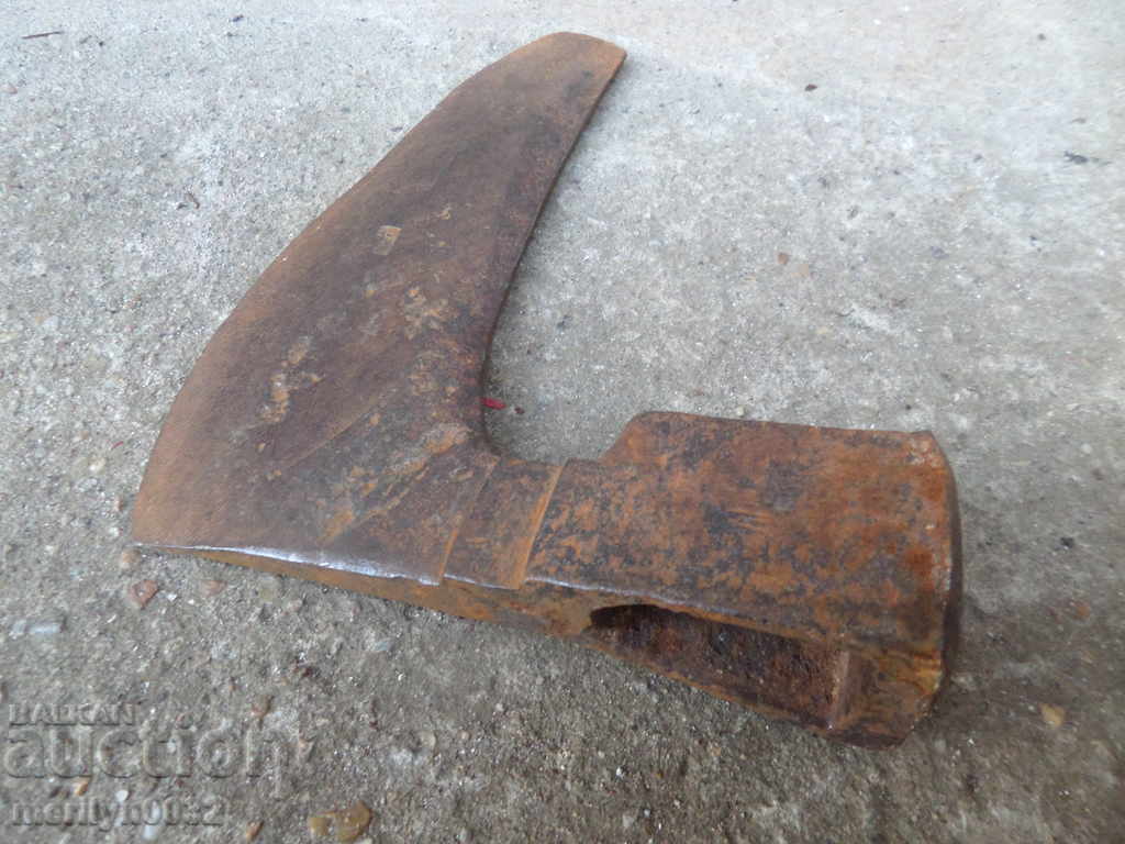 An old ax ax with a pressed toothed saber hat - 6 An old ax ax with a pressed toothed saber hat - 6