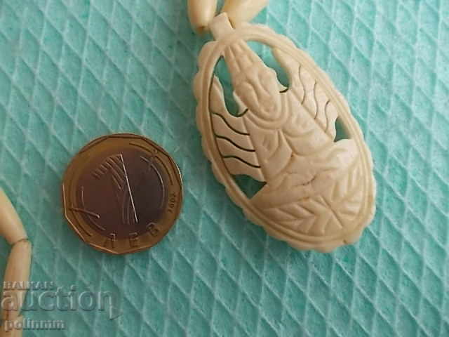 Ivory jewelry - 2 with price 35.00 BGN | € 17.90 Ivory jewelry - 2 with price 35.00 BGN | € 17.90