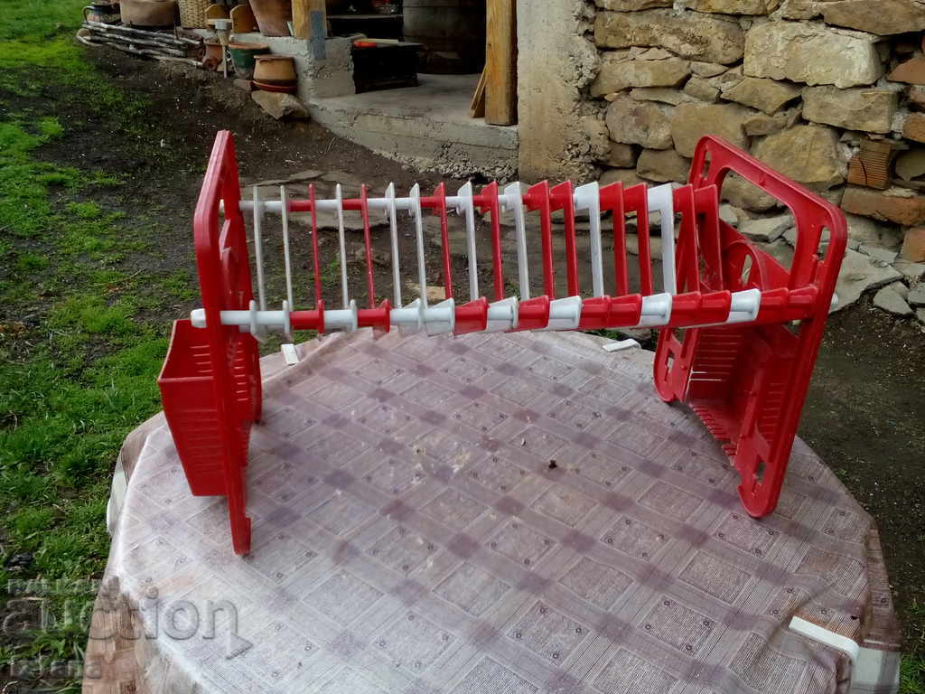 An old dryer for utensils An old dryer for utensils