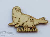 An authentic wooden magnet from Lake Baikal, Russia-series-15
