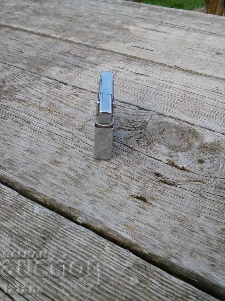 An old lighter with price 12.00 BGN | € 6.14 An old lighter with price 12.00 BGN | € 6.14