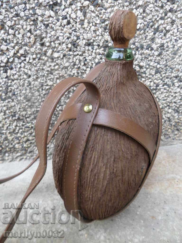 An old glass bottle with a strap with price 49.00 BGN | € 25.05 An old glass bottle with a strap with price 49.00 BGN | € 25.05