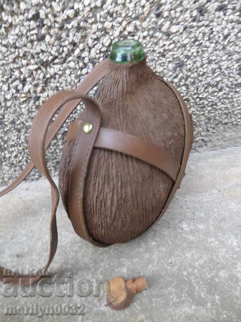 Delivery of An old glass bottle with a strap Delivery of An old glass bottle with a strap