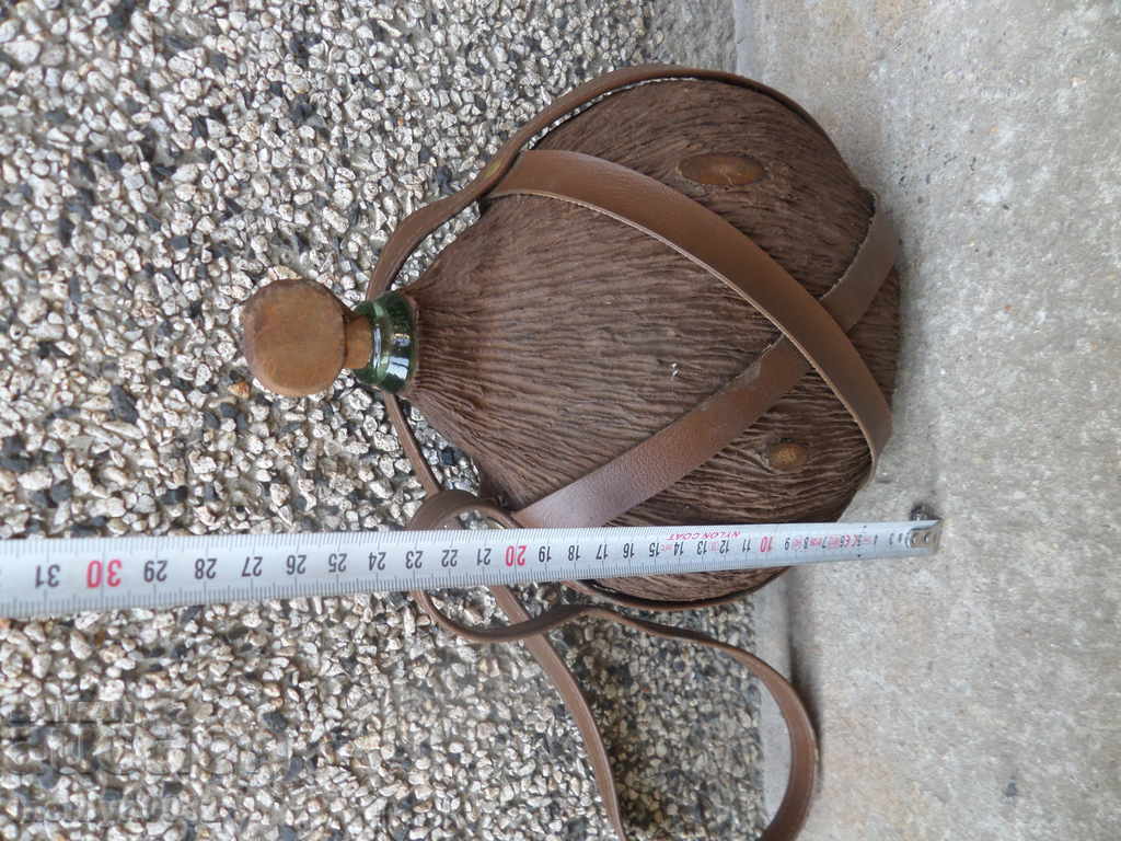 An old glass bottle with a strap - 5 An old glass bottle with a strap - 5