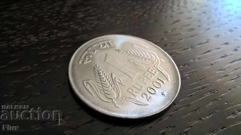 Monet - India - 1 rupia 2001.