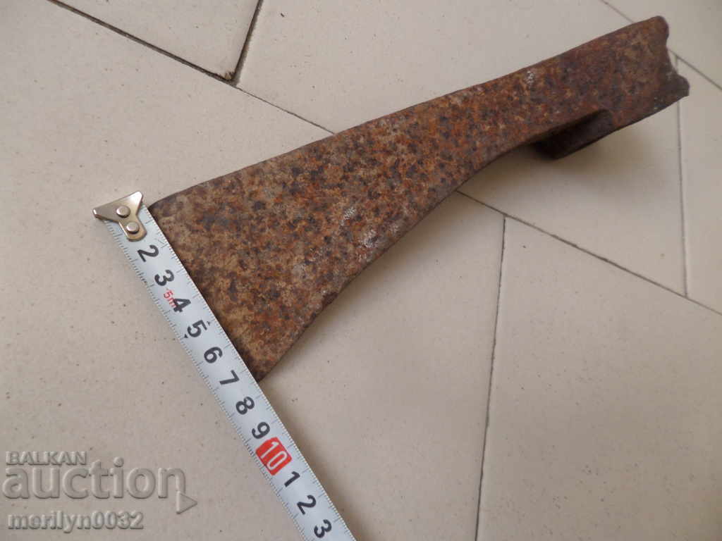 Auction An old 170-year-old ax-wrought iron toothed tool Auction An old 170-year-old ax-wrought iron toothed tool