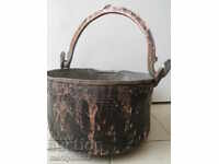 An old copper bucket, a boiler, a pot, a mallet, a baker