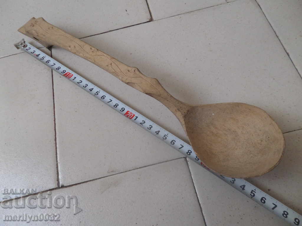 Old wooden spoon, ladle, wooden