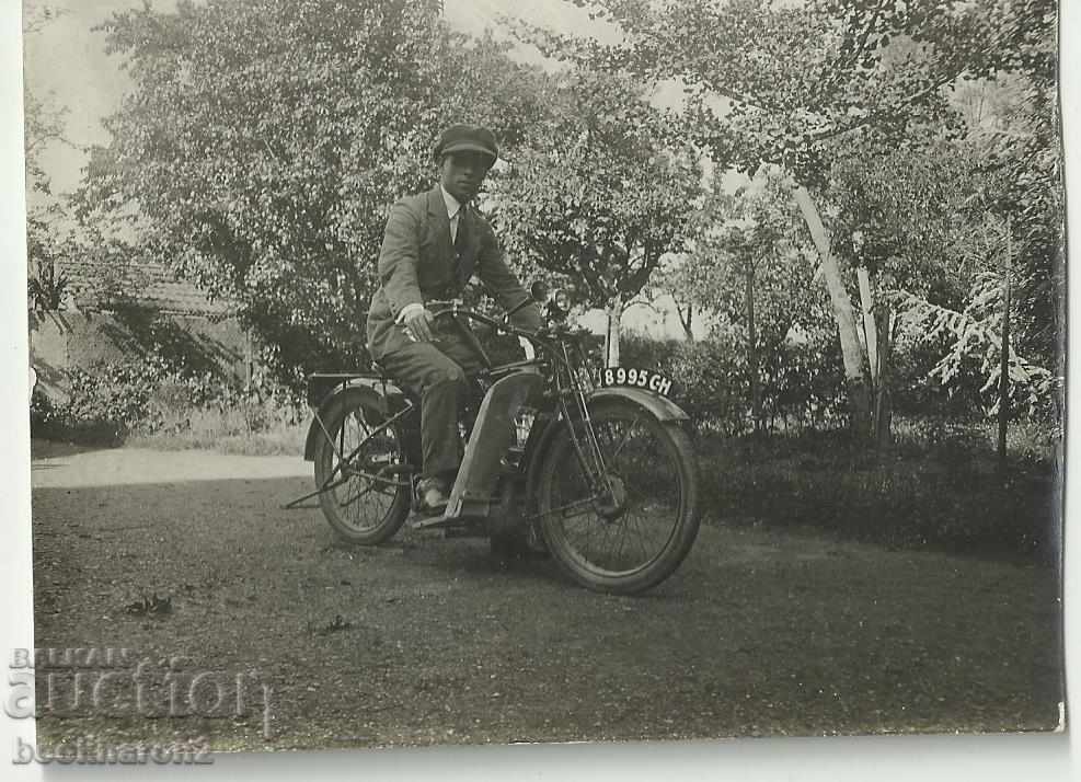 Old photo with a motorcycle