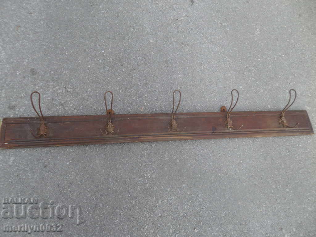 Old bourgeois hanging wooden wrought iron