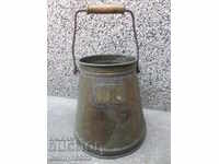 A barley measure for the brandy 1925on a jug kettle a baker copper pot bucket