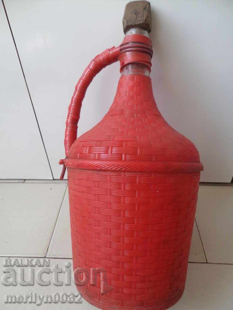 Delivery of An old glass bottle of damagan bash wine bottle for the brandy container