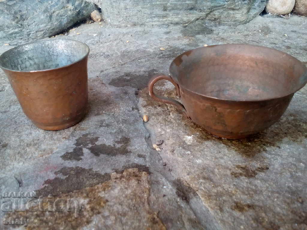 Auction  Old copper cups.