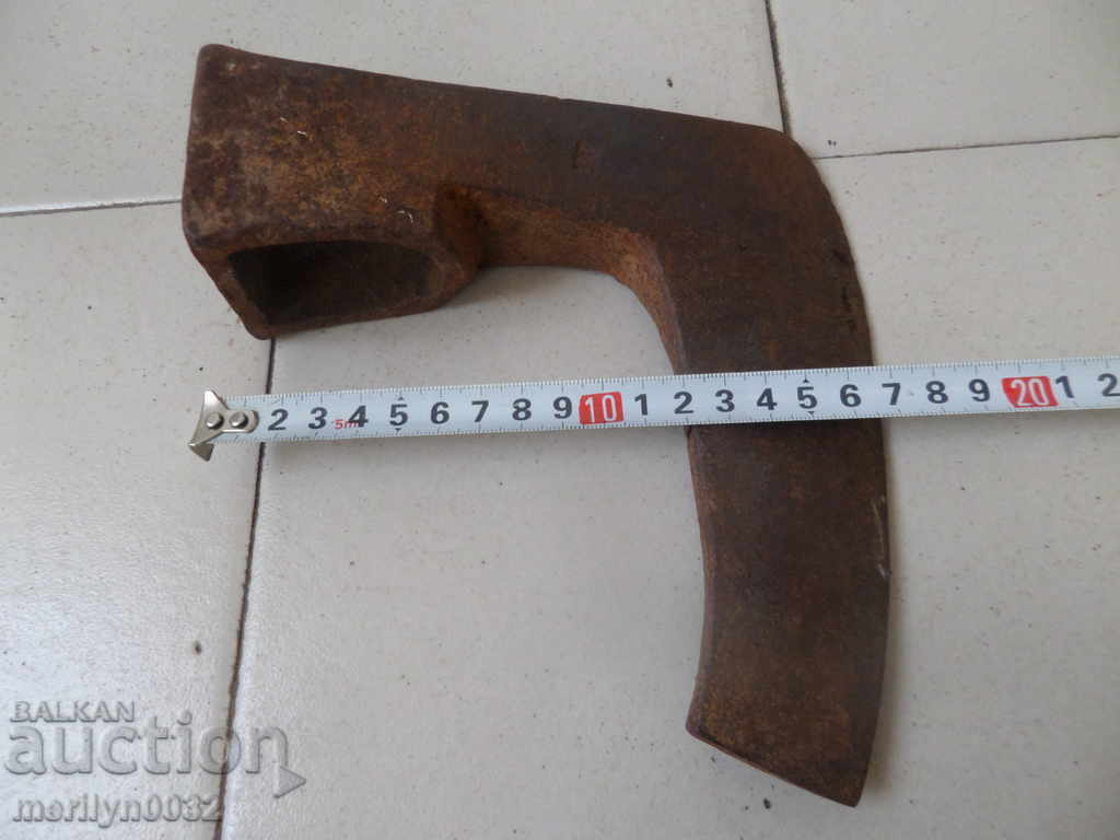 Auction  An old ax, a hatchet, a pickup tower