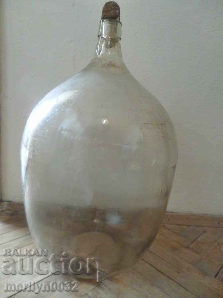 Auction An old glass bottle, a tamarind, a bottle of wine and brandy Auction An old glass bottle, a tamarind, a bottle of wine and brandy