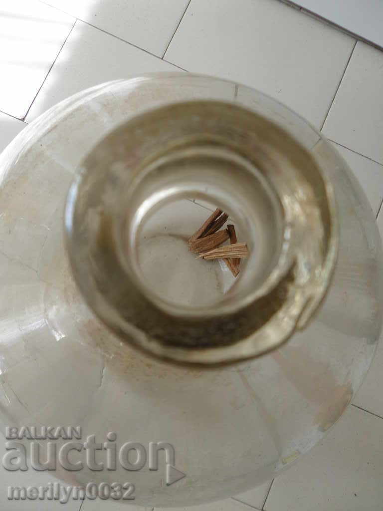 Delivery of An old glass bottle, a tamarind, a bottle of wine and brandy Delivery of An old glass bottle, a tamarind, a bottle of wine and brandy