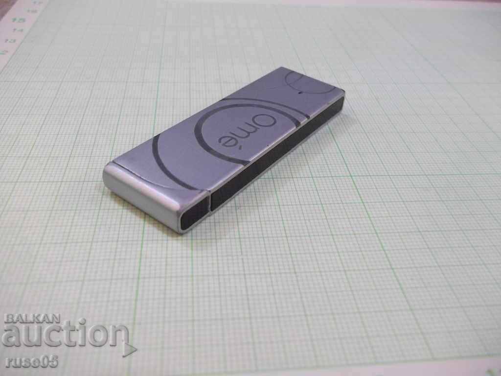 Auction  Lighter "Omé" gas piezo crystalline with soft flame working