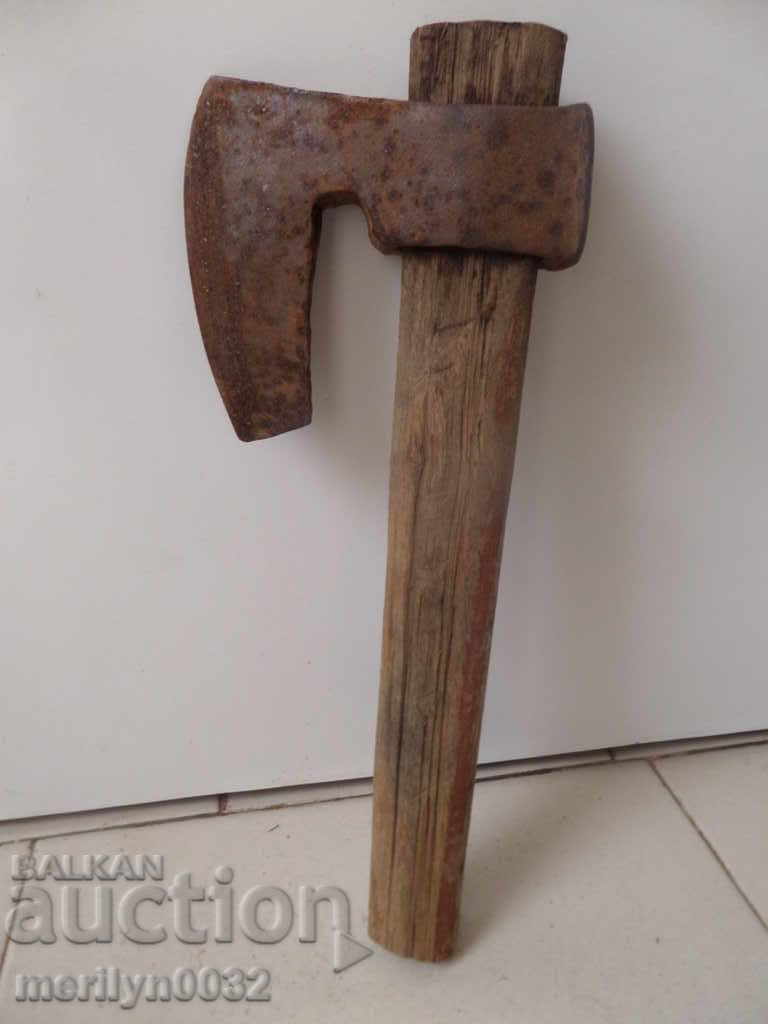 Old ax ax tool wrought iron pole