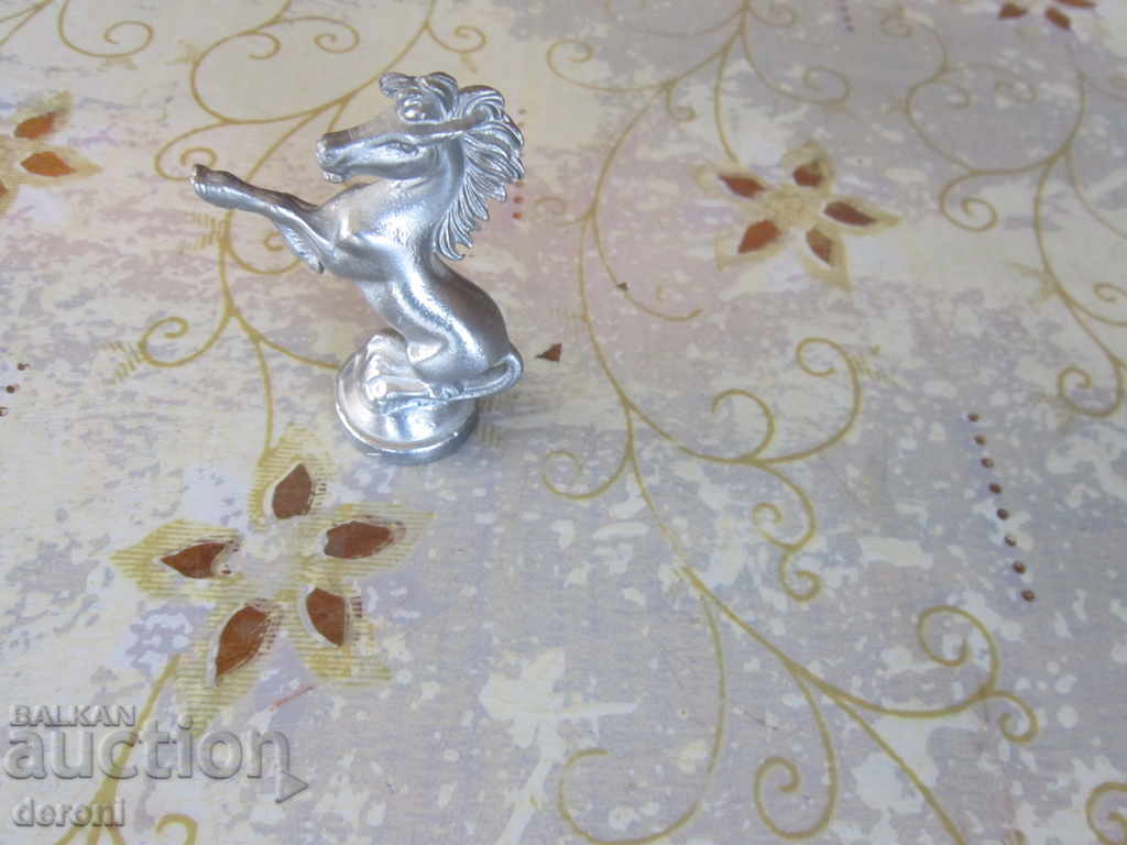 Delivery of An old figure piece of plastic on a horse Delivery of An old figure piece of plastic on a horse