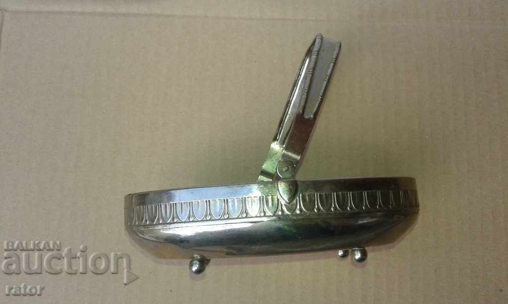 Delivery of An old metallic, bronze basket for nuts, candy