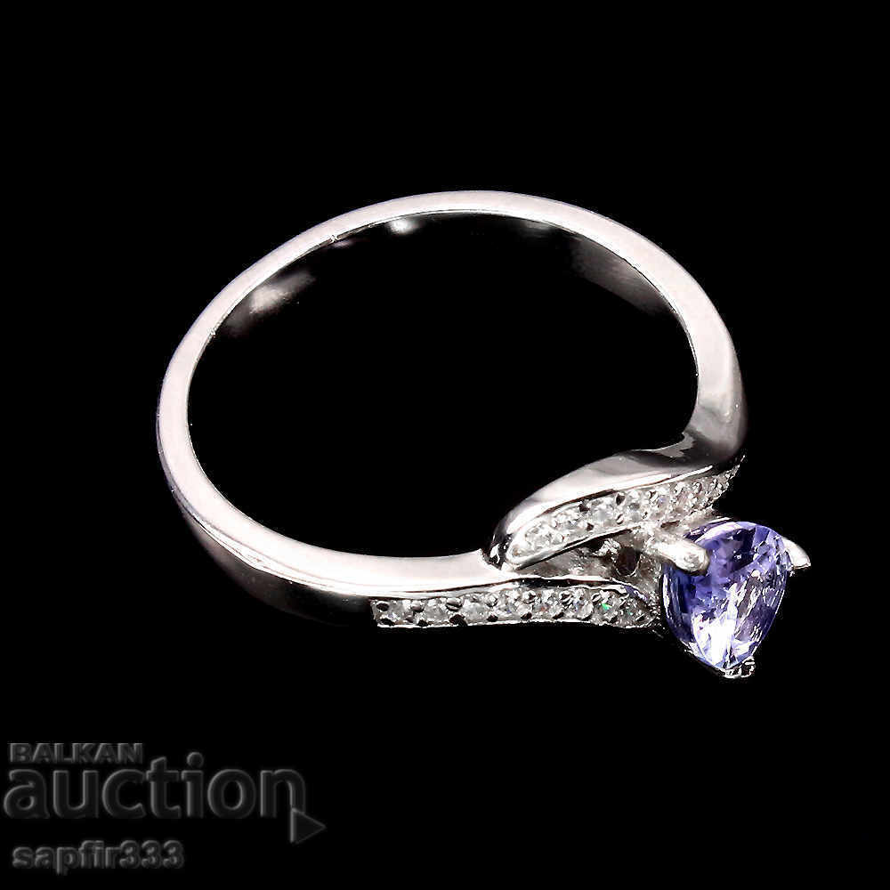 Auction  ELEGANT SILVER RING WITH NATURAL TANZANITE AND CYCLONS