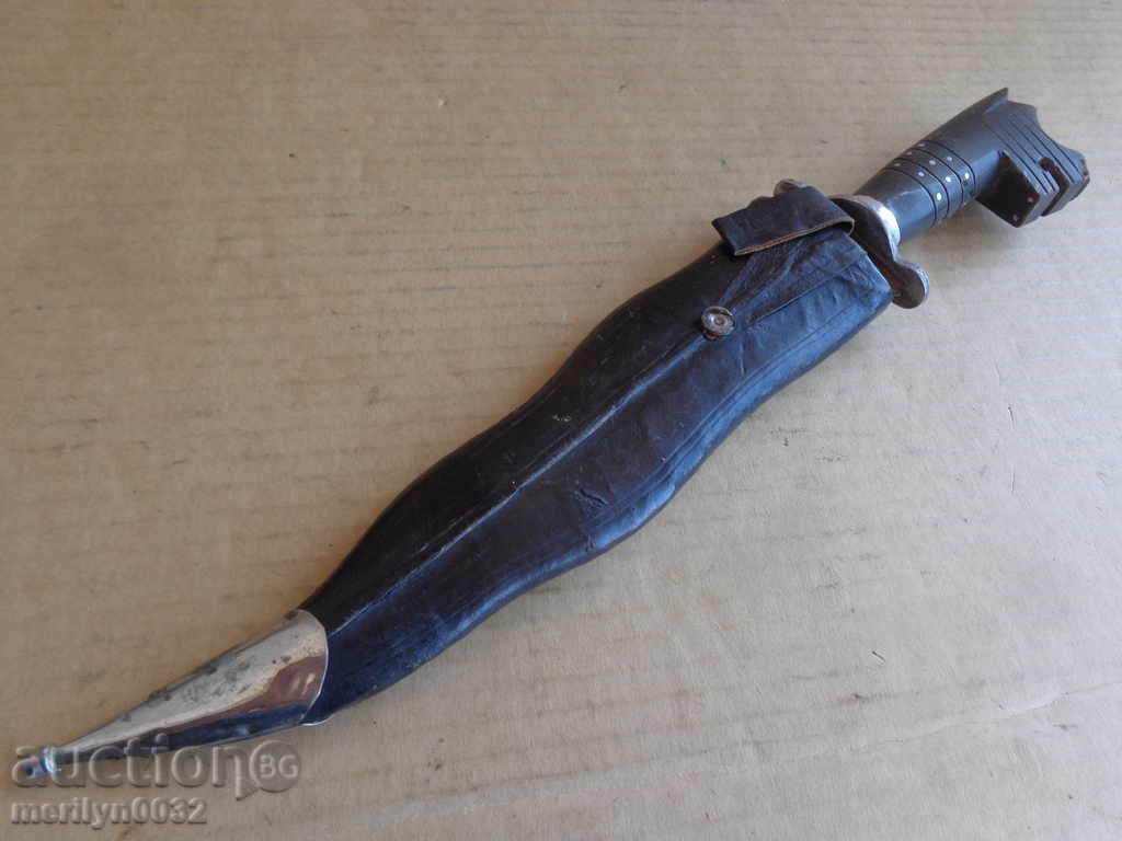 An old dagger with a cane crest handmade knife blade knife