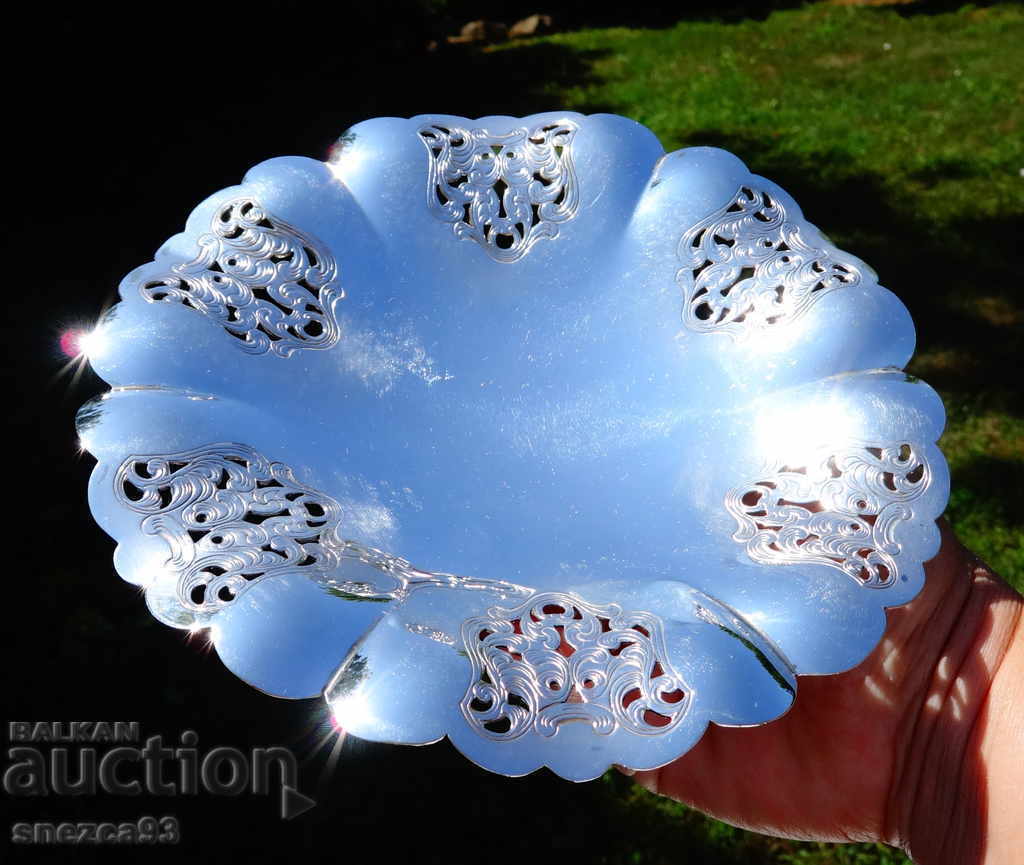 Silver-plated fruit bowl with openwork, marked. Silver-plated fruit bowl with openwork, marked.