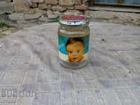 An old jar of baby food, puree
