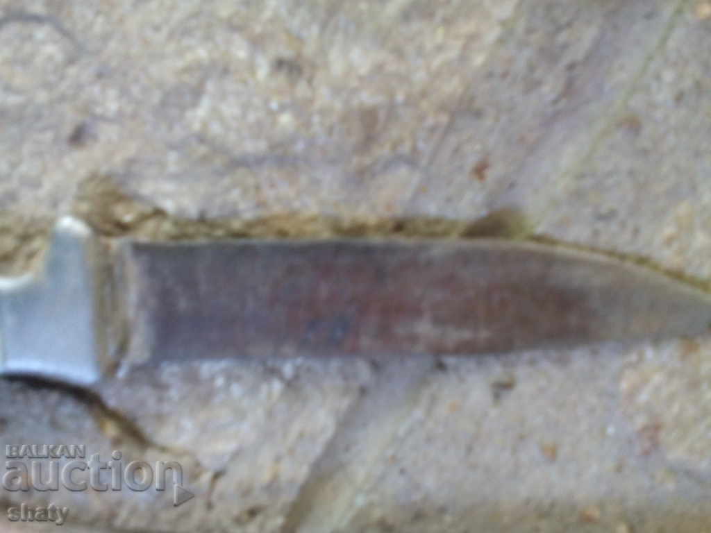 Auction  An old knife.