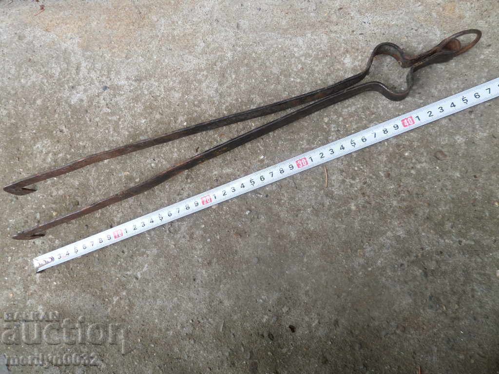 Delivery of Old hand forged dilaf, wrought iron, mask Delivery of Old hand forged dilaf, wrought iron, mask