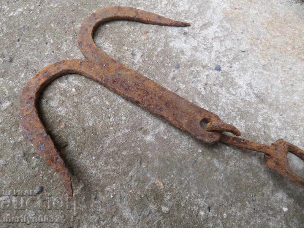 Delivery of Old forged hook, quail, anchor, hook for diving Delivery of Old forged hook, quail, anchor, hook for diving