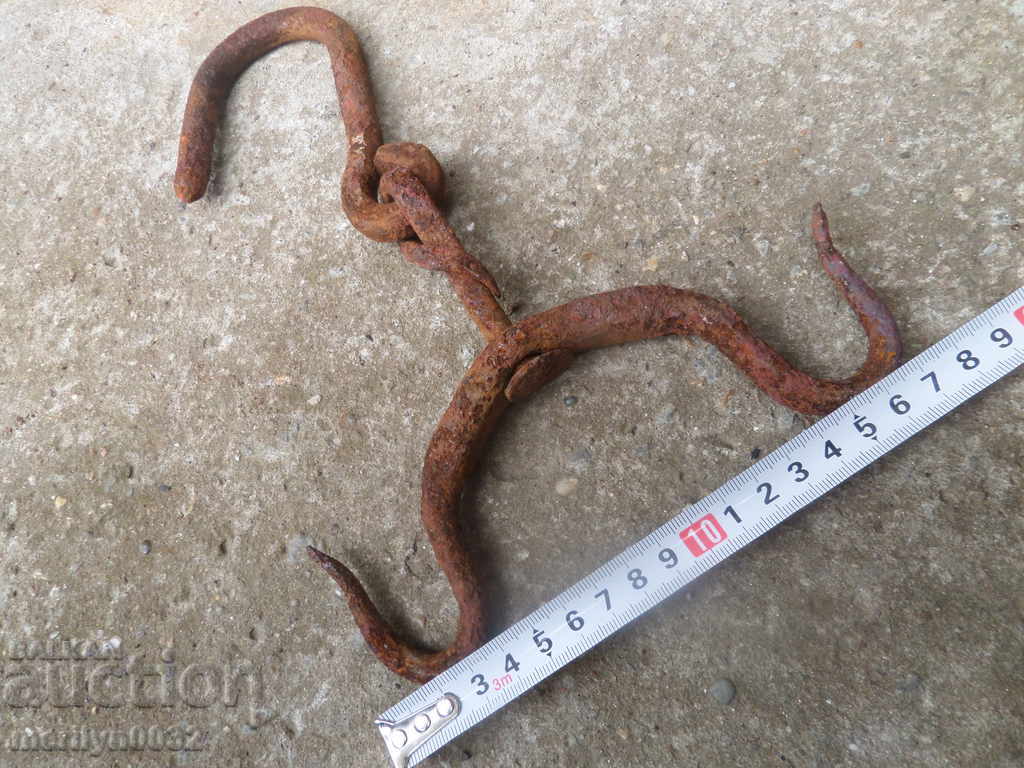 Delivery of Old forged hook, quail, anchor, hook for diving Delivery of Old forged hook, quail, anchor, hook for diving