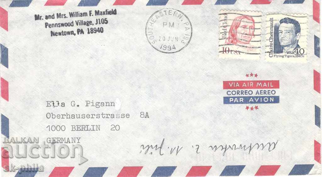 Postage envelope - traveled from the US to Berlin