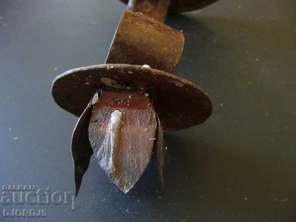 An old forged candlestick with price 5.00 BGN | € 2.56 An old forged candlestick with price 5.00 BGN | € 2.56