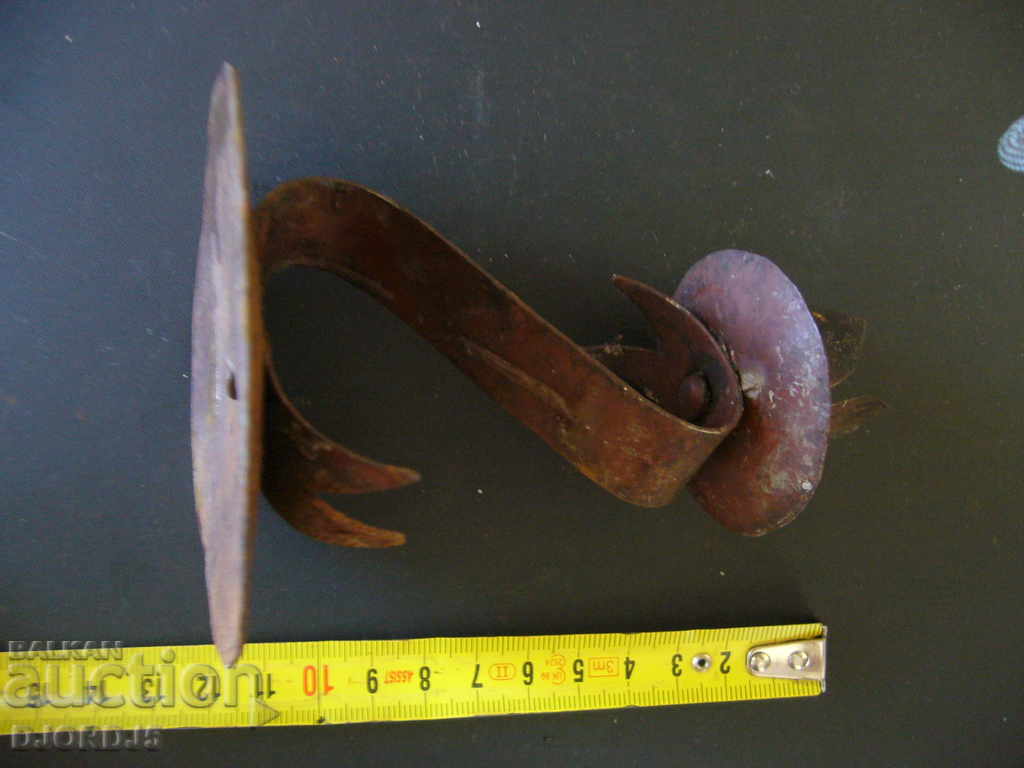 Delivery of An old forged candlestick Delivery of An old forged candlestick