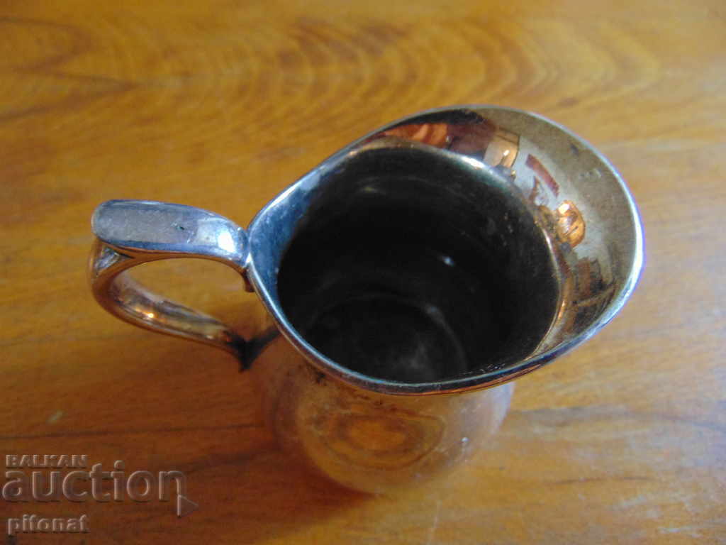 Аукцион Антикварна посребрена каничка за мляко A. FRENAIS Аукцион Антикварна посребрена каничка за мляко A. FRENAIS