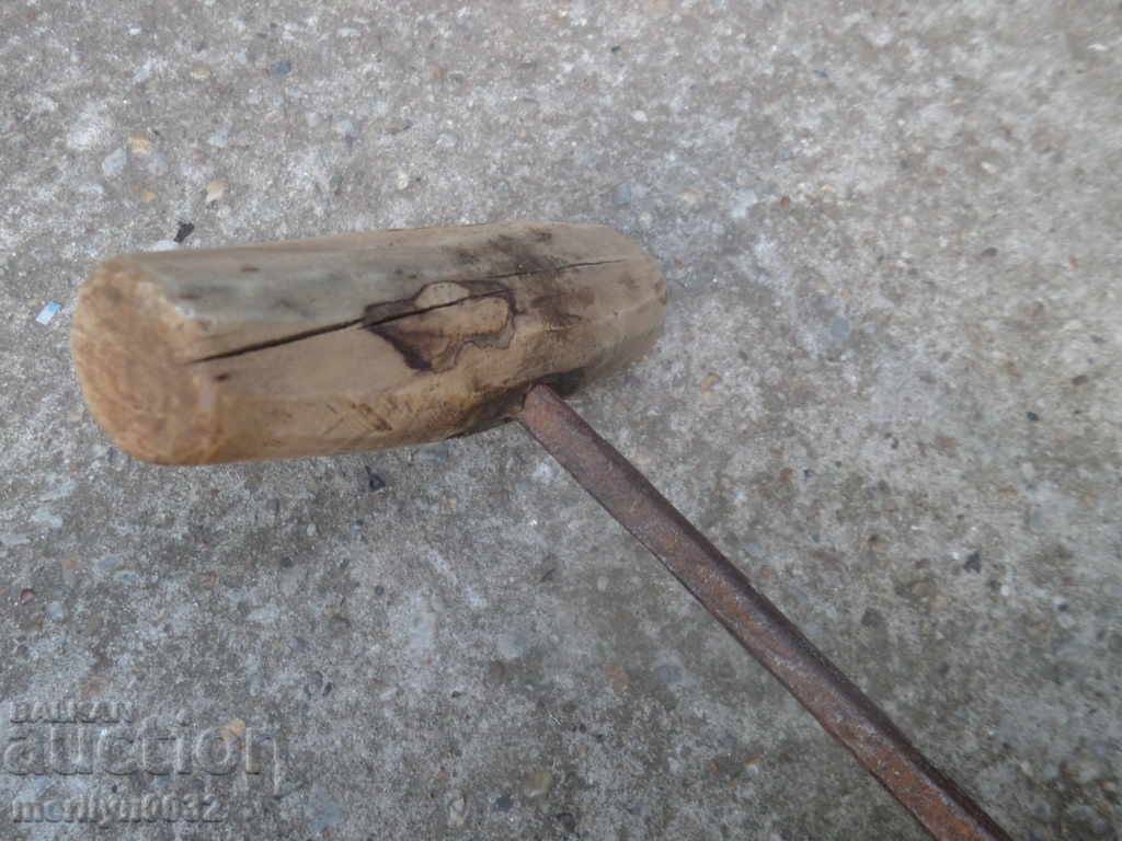 Auction Ancient crutch, burgundy, screwdriver, wrought iron Auction Ancient crutch, burgundy, screwdriver, wrought iron