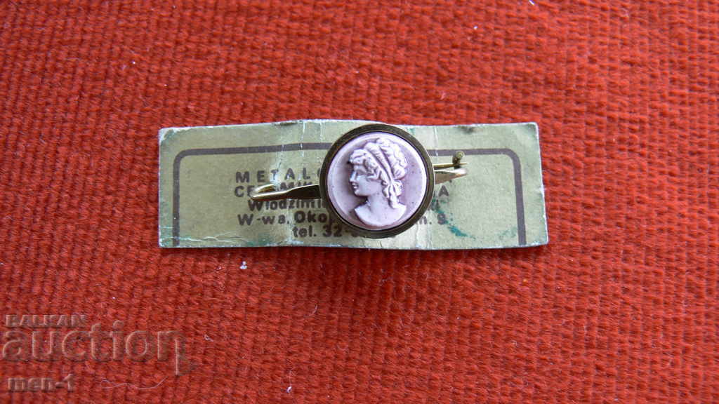 Auction Brooch with a camel Auction Brooch with a camel