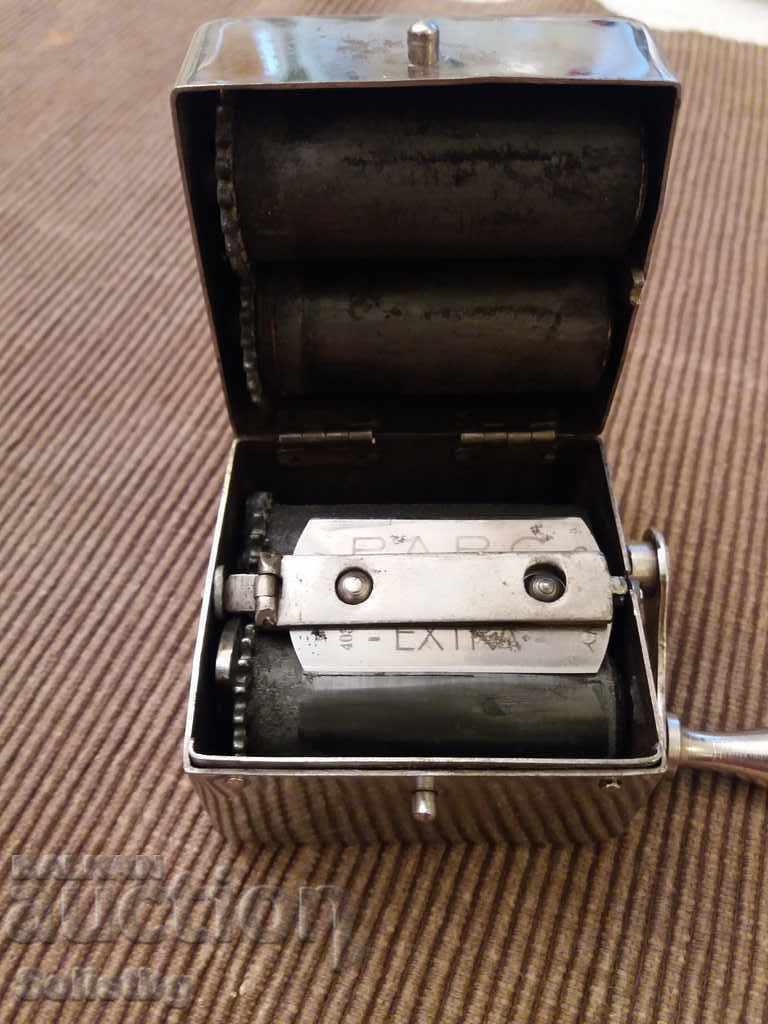 Auction Machine for sharpening razor blades. Auction Machine for sharpening razor blades.