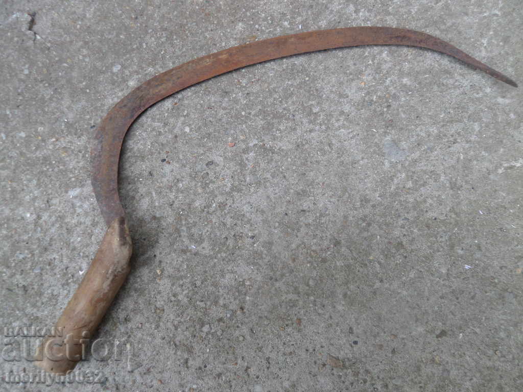 Old scythe sickle, blade, wrought iron