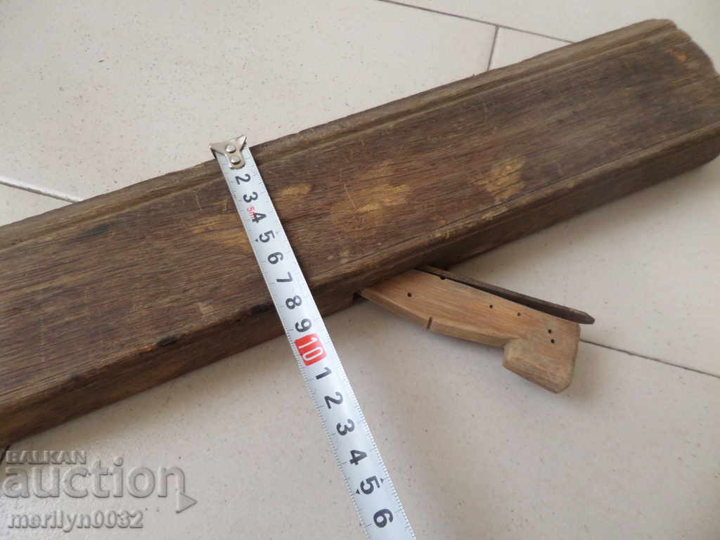 Auction  Old woodworking planer tool with knife