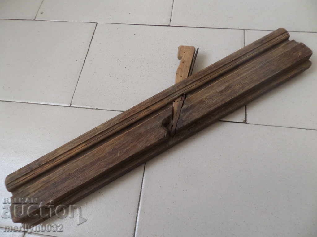 Old woodworking planer tool with knife