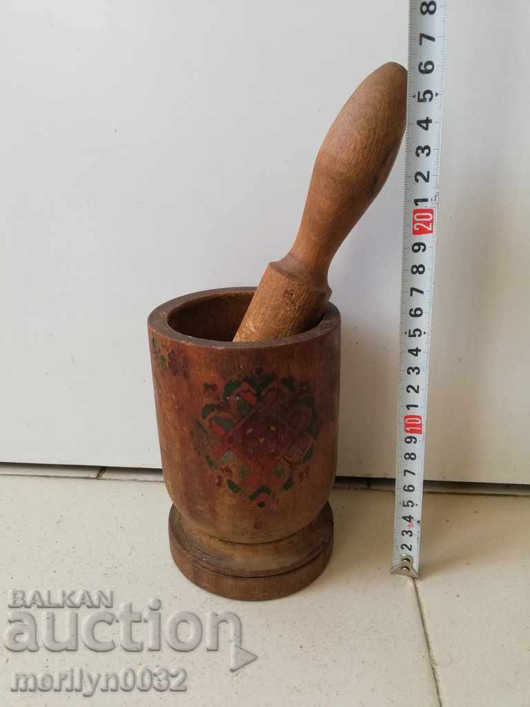 Delivery of Old wooden mortar, hammer, mortar