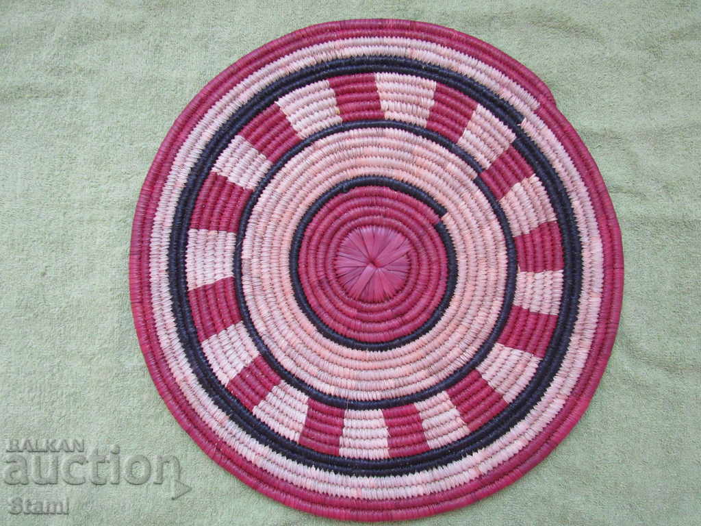 Hand-woven decorative raffia mat, Africa