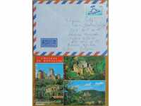 Traveled envelope with postcard from France, 1980s