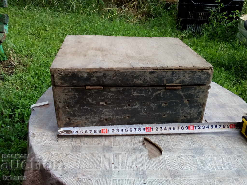 Auction  Antique wooden suitcase