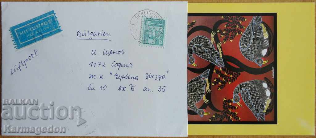 A traveling envelope with a postcard from the GDR, from the 1980s A traveling envelope with a postcard from the GDR, from the 1980s