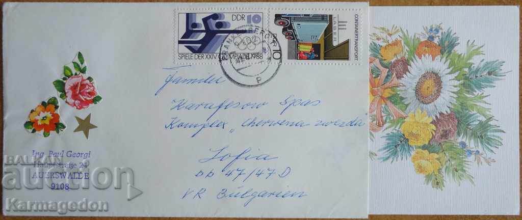 A traveling envelope with a postcard from the GDR, from the 1980s