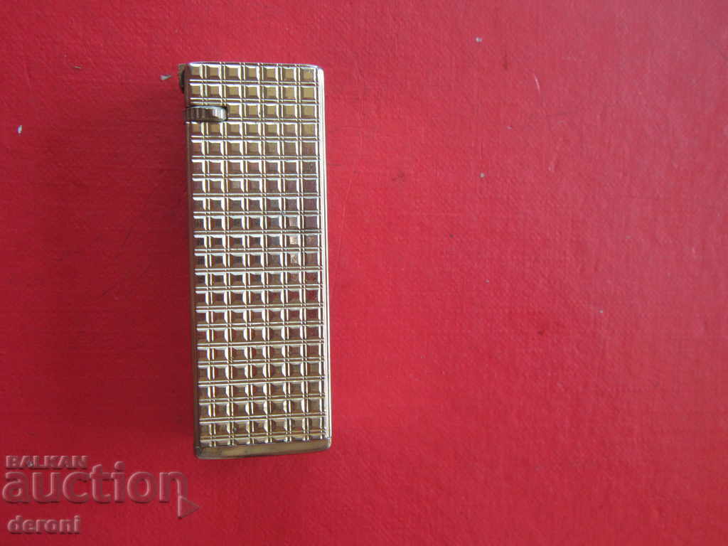 Auction  Unique Quadriga gilded lighter